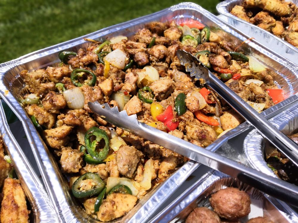 Lemongrass chicken stir-fried with jalapeños, onions and bell peppers